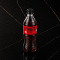 Coca-Cola Zero 400 ml fría para acompañar las Papotas